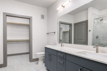 Bathroom with closet at MAA Windmill Hill Luxury Apartments in Austin, TX