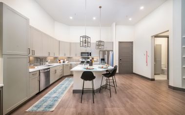 Kitchen and dining at MAA Frisco Bridges luxury apartment homes in Dallas, TX