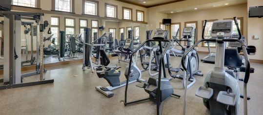 Fitness center at MAA Grand Courtyards luxury apartment homes in Dallas, TX