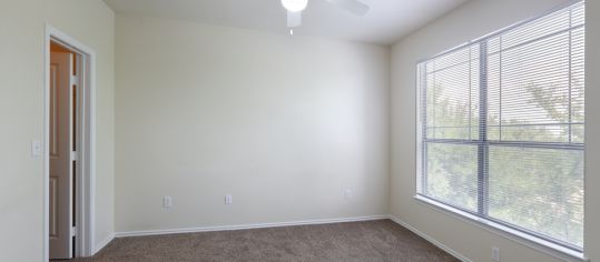 Bedroom at MAA Grand Courtyards luxury apartment homes in Dallas, TX