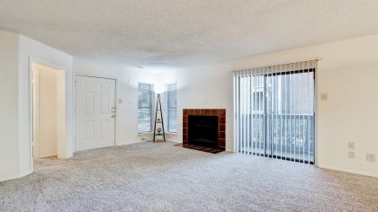 Living Room at Courtyards at Campbell luxury apartment homes in Dallas, TX