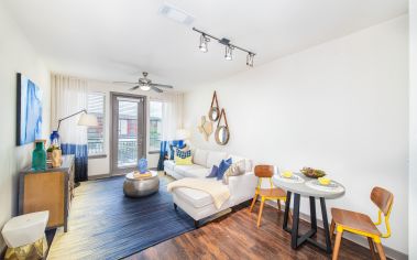 Living and dining area at MAA Market Center Plano, TX Apartment Homes