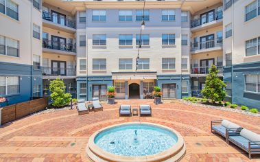 Courtyard fountain at MAA McKinney Ave luxury apartment homes in Dallas, TX