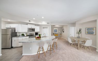 Wide angle kitchen and living at MAA McKinney in Dallas, TX