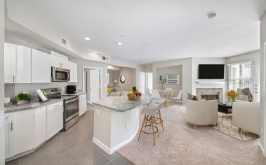 Wide angle kitchen and living room at MAA McKinney in Dallas, TX