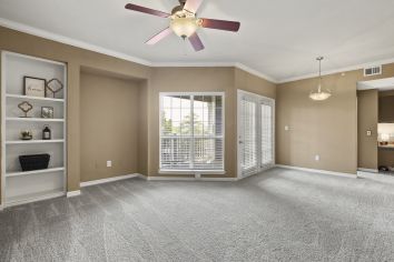 Living Room 2 at MAA Stonebridge Ranch luxury apartment homes in McKinney, TX