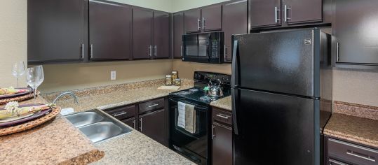 Kitchen 2 at Venue at Stonebridge Ranch luxury apartment homes in McKinney, TX