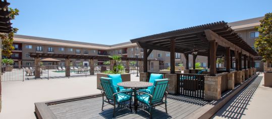 Courtyard Seating  at Times Square at Craig Ranch luxury apartment homes in Dallas, TX