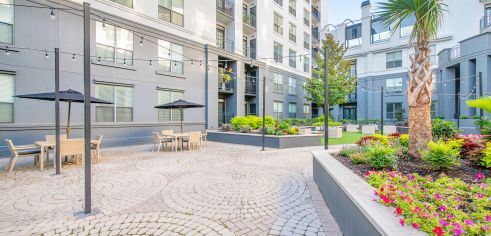 Courtyard walkway at MAA Worthington luxury apartment homes in Dallas, TX