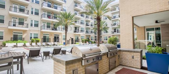 Outdoor grill area at MAA Afton Oaks luxury apartment homes in Houston, TX