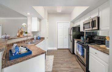 Kitchen at MAA Greenwood Forest luxury apartment homes in Houston, TX