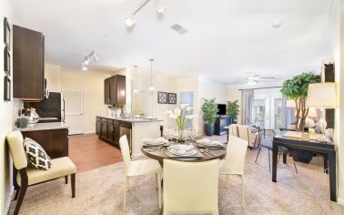 Dining and living area at Seasons at Celebrate Virginia luxury apartment homes in Fredericksburg, VA