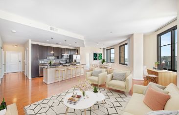 Living room and kitchen at Post Carlyle Square in Washington, DC