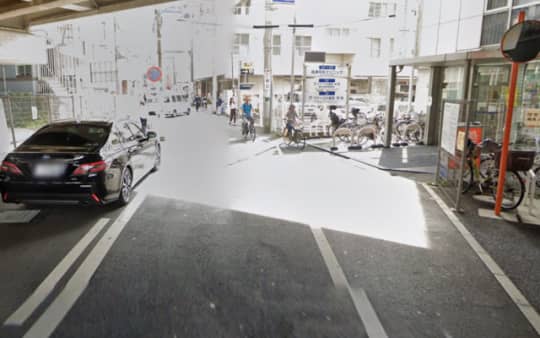 東急溝の口駅北駐輪場前の道