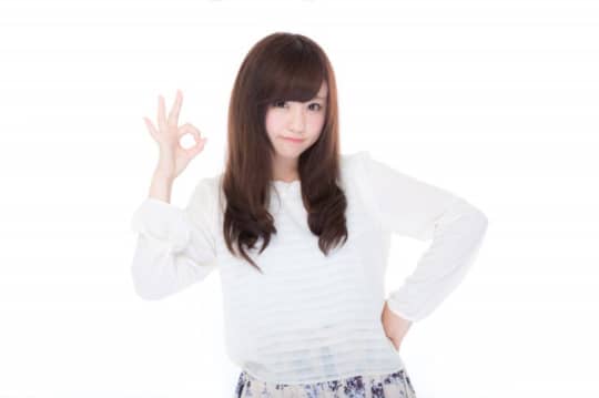 OKサインの女