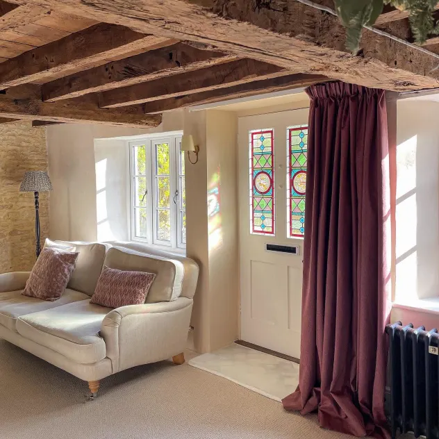 red curtain in neutral hallway