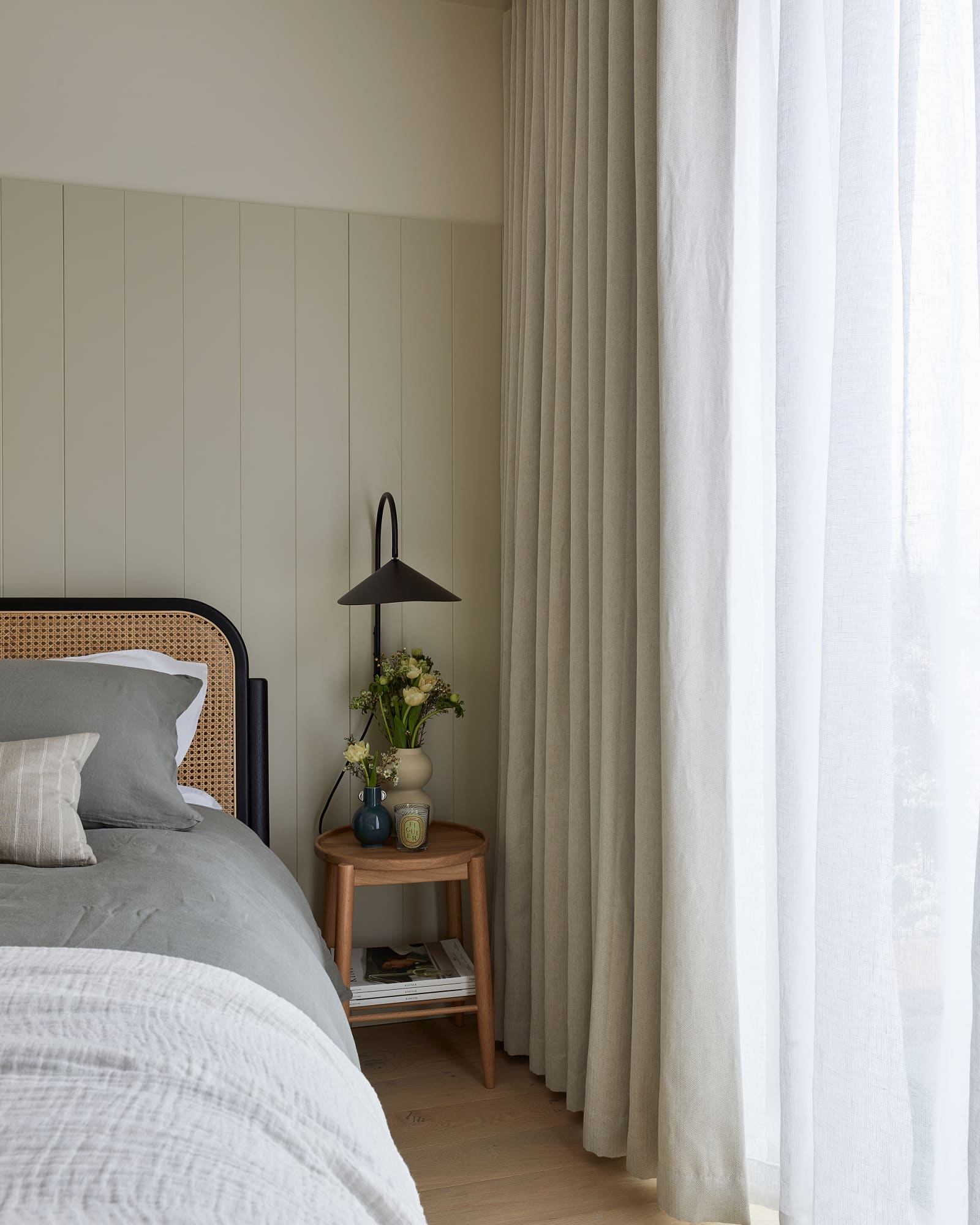 double layered neutral made to measure curtains in a london bedroom