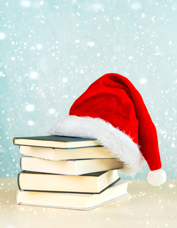 Books with Santa hat