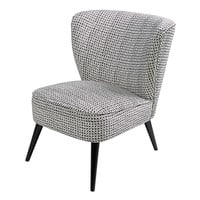 Fauteuil en velours motifs noirs et blancs Fauteuil en velours motifs noirs et blancs