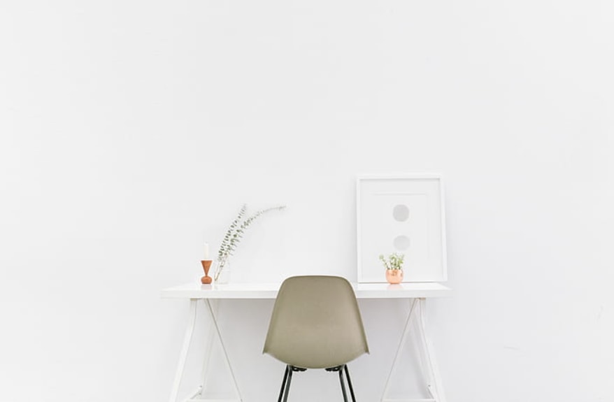 Minimalist room with standard overhead lighting