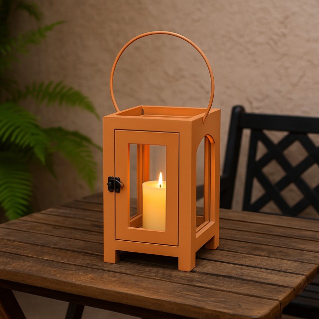 Orange lantern on wooden table perfect for summer outdoor dining