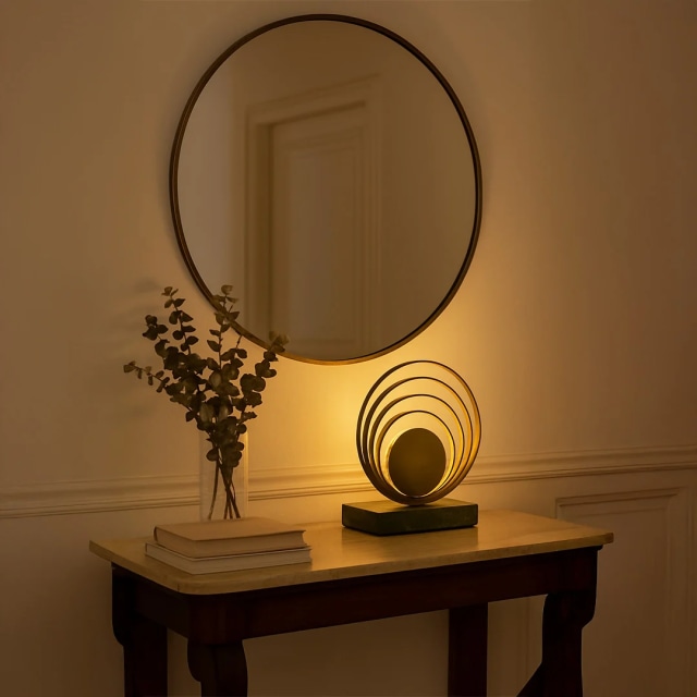 Elegant table lamp with circular design and warm lighting