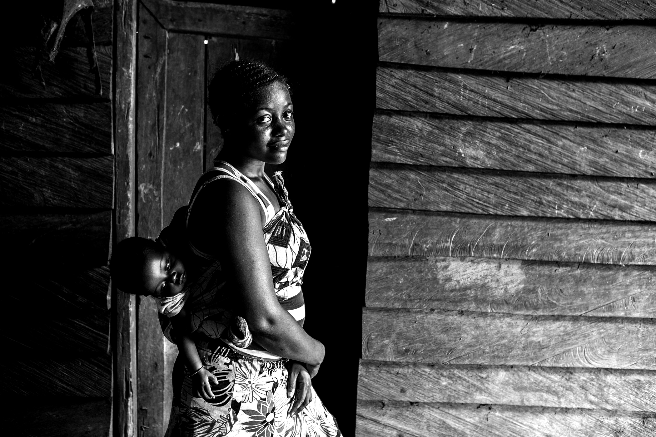 Image-of-an-african-teen-carrying-a-baby