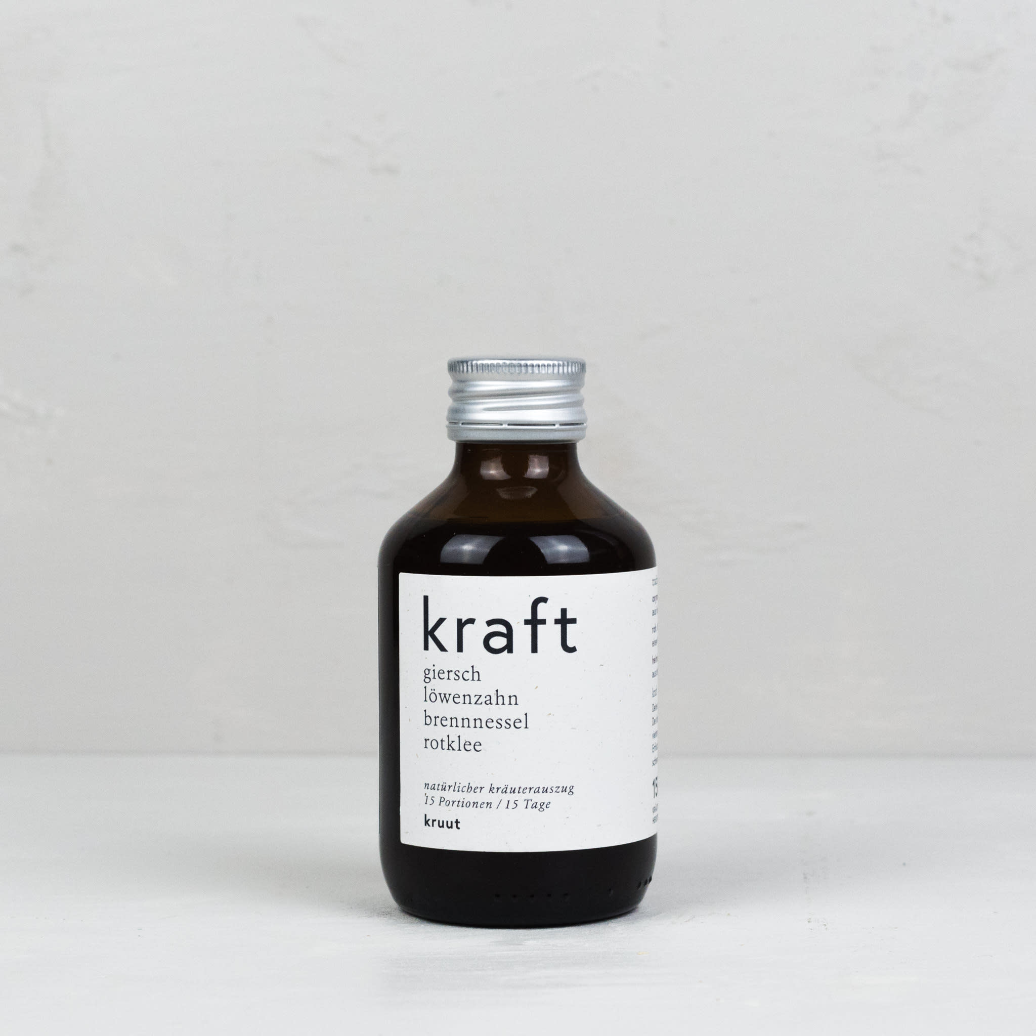 Flasche Wildkräuter in Honig und Essig