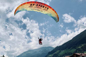 Tandem paragliding flight over Stubai Valley in Schlick, near Innsbruck