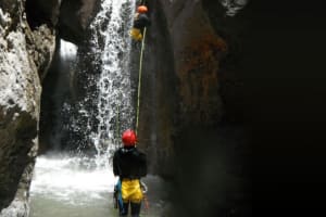 Canyoning excursion at Sant Pere Canyon near Sort, Pyrenees