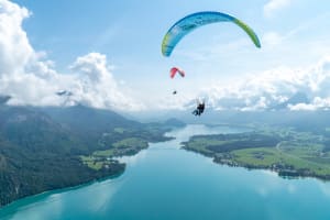 Tandem paragliding flight above Wolfgang Lake, near Salzburg 