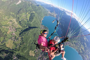Paragliding flight over the lake of Annecy, Haute-Savoie