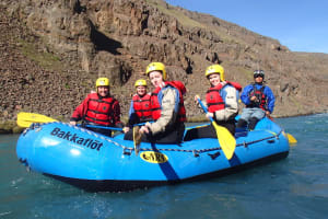 Family rafting down the West Glacial River, Northwestern Region of Iceland