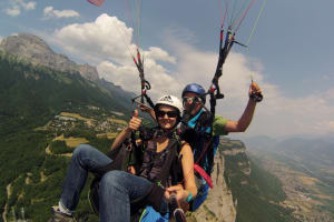 Tandem paragliding flight over Saint-Hilaire near Grenoble