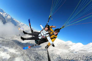 Winter Tandem paragliding flight over Verbier