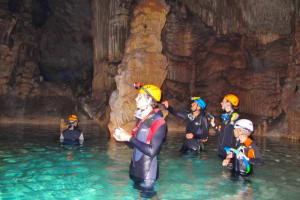 Water caving in Es Coloms near Porto Cristo, Mallorca