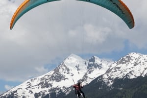 Tandem paragliding flight over Stubai Valley in Elferlifte, near Innsbruck