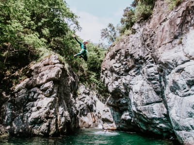 Sporty Canyoning down Rio Lerca near Genova