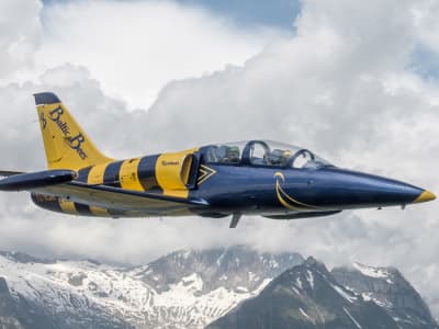 Jet fighter flight (L-39) over the Swiss Alps from Sion