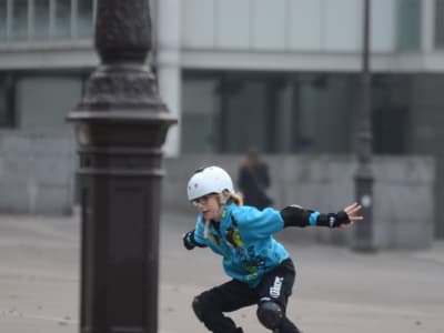 Rollerblading lessons on the Place de la Bastille, Paris