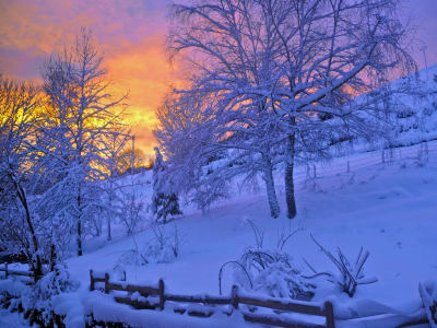 Raquetas de nieve al atardecer en el Lago Blanco