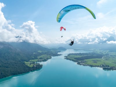 Tandem paragliding flight from the Zwolferhorn over St. Gilgen, Wolfgangsee, Austria