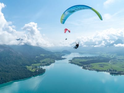 Tandem paragliding flight above Wolfgang Lake, near Salzburg 