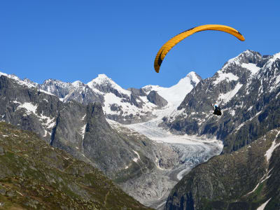 Tandem paragliding over the Aletsch Glacier from Brig, Switzerland