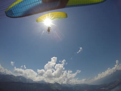 Tandem paragliding flight above Interlaken