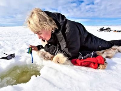 Snowmobiling and Ice Fishing in Rovaniemi