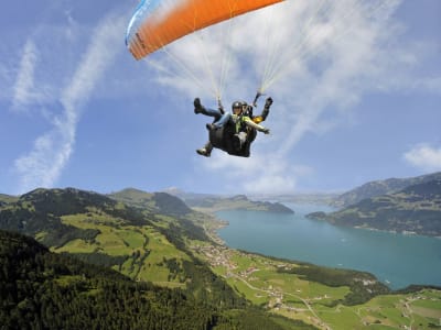 Tandem paragliding flight over Lake Lucerne from Emetten, Switzerland