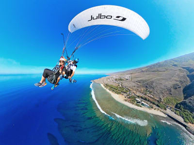 Tandem paragliding flight over the lagoon of Saint-Leu, Reunion Island