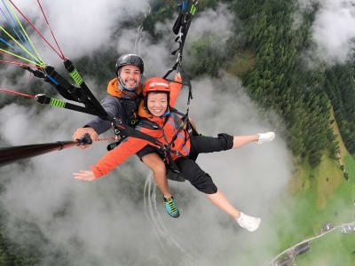 Tandem paragliding flight over Stubai Valley in Schlick, near Innsbruck