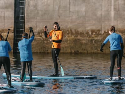 Clases de stand-up paddle en Cullen, en Moray Firth